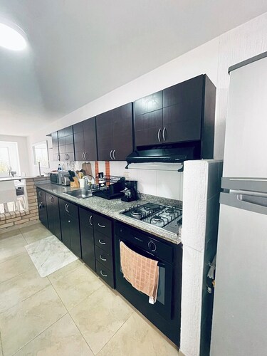 Entire home with Air Conditioner, Water heater & private Car garage 