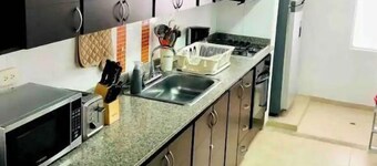 Entire home with Air Conditioner, Water heater & private Car garage 