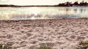 A beach with a sandy shore and calm water. - Amazing home in Ronneby with WiFi (Ronneby)
