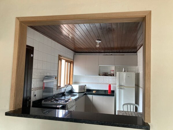 Fridge, microwave, stovetop, cookware/dishes/utensils