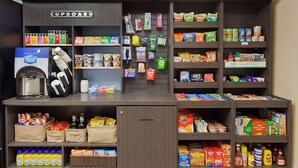 A kitchenette area with a coffee maker, various food items, and a 'Cupboard' sign. - Pet-friendly Lodging Near South Jersey Regional Airport! FREE Parking, Kitchen! (Mount Laurel Township)