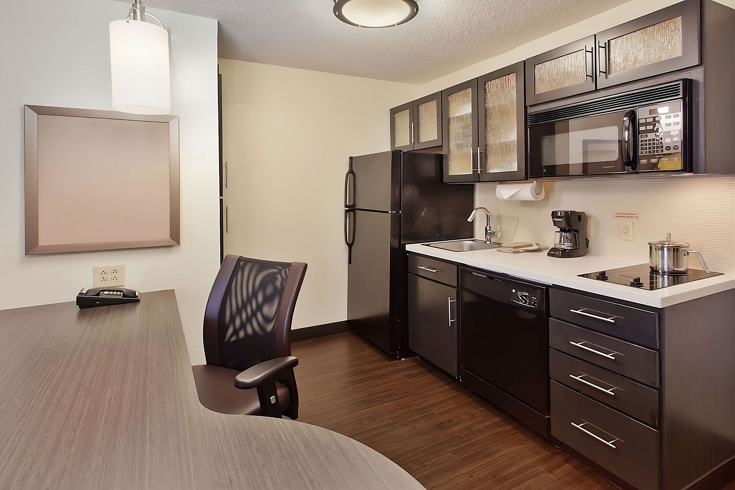 Enjoy a practical kitchenette setup for longer, easier stays.