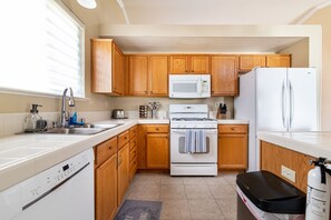 Fridge, microwave, dishwasher, coffee/tea maker