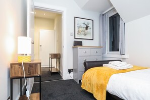 1 غرفة نوم ومكواة/لوح كي وواي فاي مجانًا وملاءات أسرّة