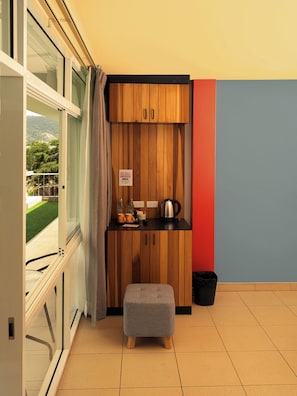Deluxe Double Room, 1 King Bed, Garden View | Living area | Flat-screen TV, fireplace