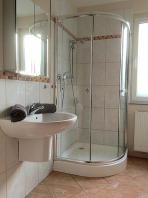 Shower, hair dryer, towels, soap