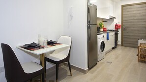 Standard Apartment | In-room dining - Studio Apartment in Bloom Tower B JVC (Dubai)