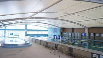 Indoor pool, open 9:00 AM to 9:00 PM, lifeguards on site