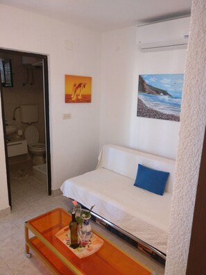 Apartment (One Bedroom Apartment with Terrace (G) | Living room | 25-inch flat-screen TV with cable channels, TV