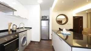 Private kitchen - 1 Bedroom Apartment in The Matrix Tower (Dubai)