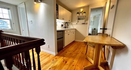 2 bedroom suite: King, Queen, parking, kitchenette, central, upper level