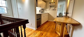 2 bedroom suite: King, Queen, parking, kitchenette, central, upper level