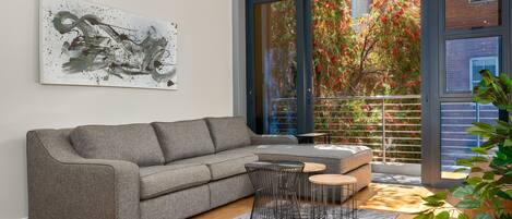 Luxury Apartment | Living area | 48-inch flat-screen TV with cable channels, TV, Netflix