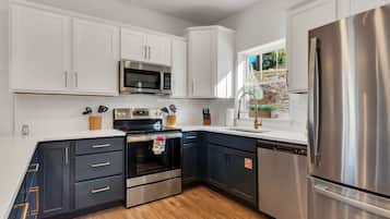Cottage, 5 Bedrooms | Private kitchen | Fridge, oven, coffee/tea maker, toaster