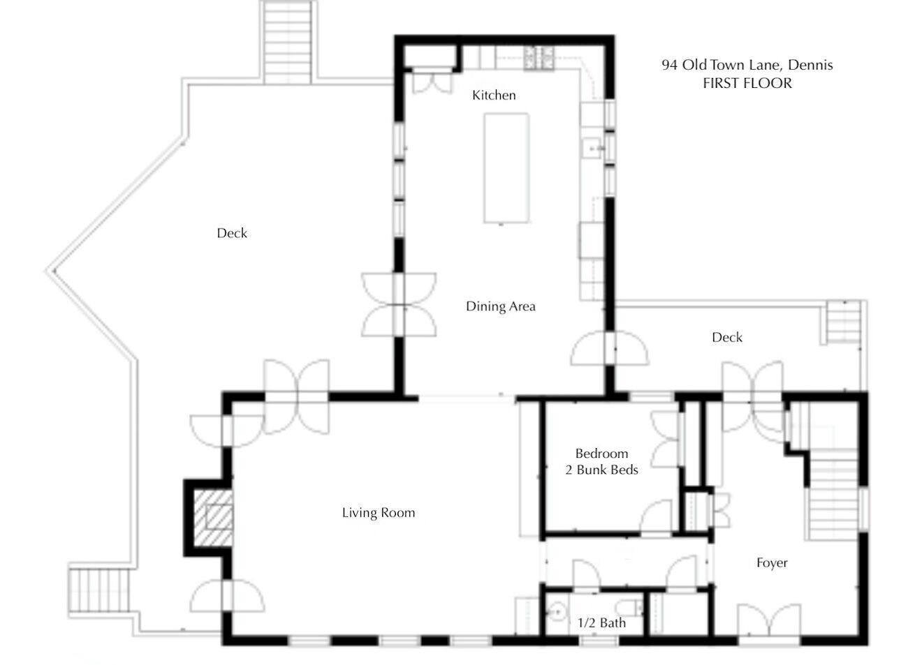 A floor plan of a first-floor apartment at 94 Old Town Lane, Dennis, featuring a kitchen, dining area, living room, two bunk beds, a half bath, and a foyer.