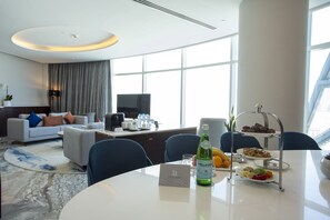 Presidential Room | Living area | 52-inch Smart TV with cable channels, TV, Netflix - Century Marina Hotel Lusail (Doha)