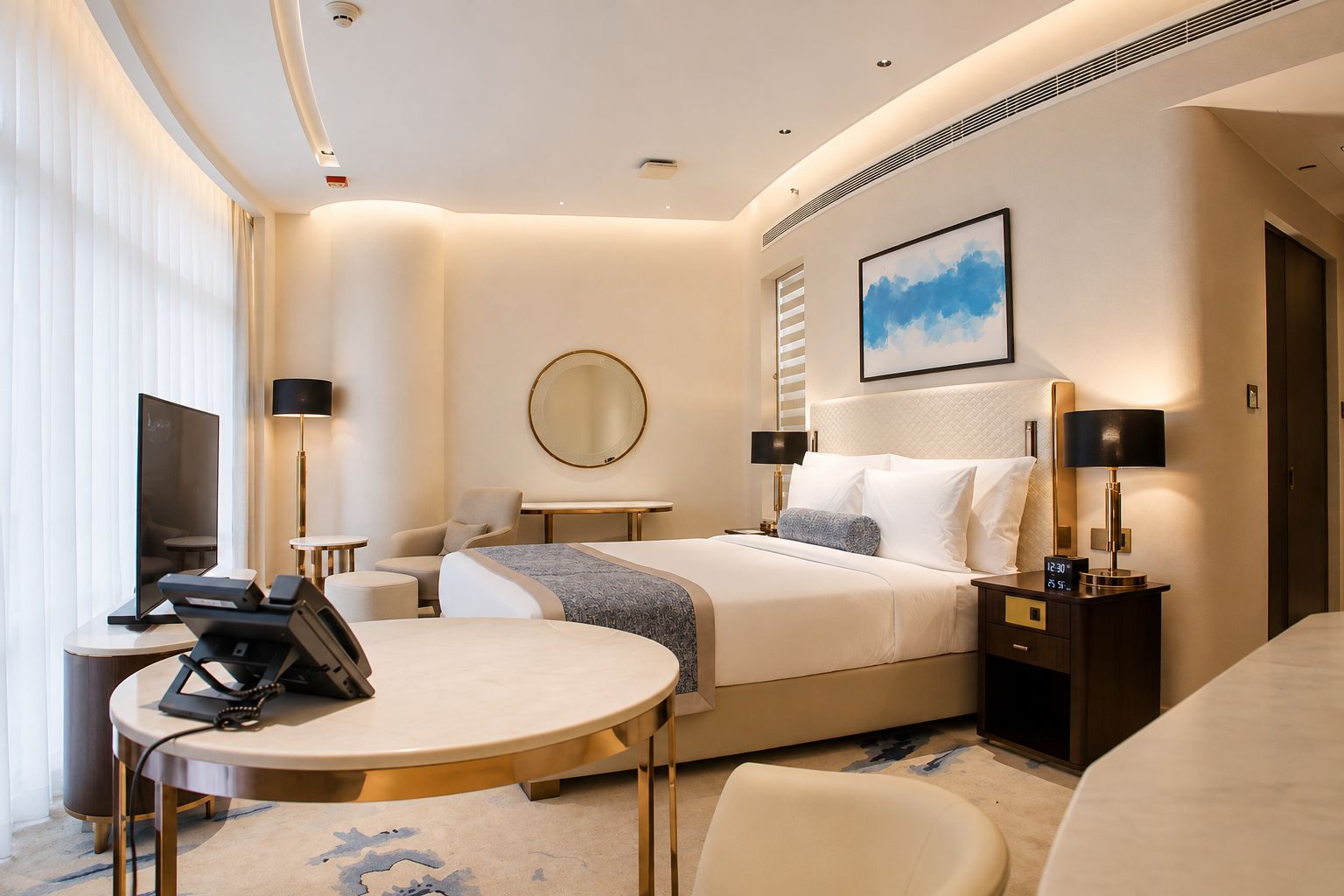 A hotel room with a bed, bedside tables, a desk, a chair, a television, and a large window.
