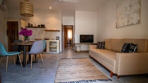 Suite Deluxe | Sala d'estar | Televisor de plasma
