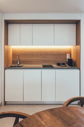 Mini-fridge, microwave, stovetop, dishwasher