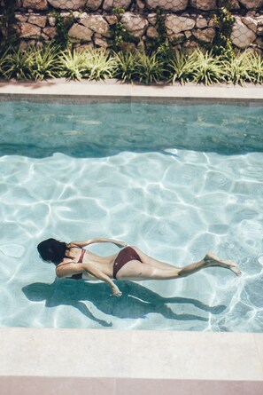 2 outdoor pools, open 9:00 AM to 9:00 PM, pool loungers