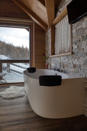 Bathtub, hair dryer, towels