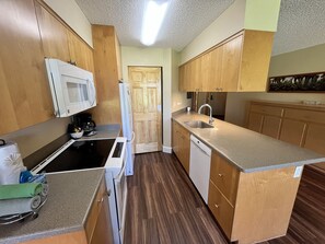 Fridge, microwave, oven, stovetop - Maui Sunset A415: 1  BR, 2  BA Condominium in Kihei, Sleeps 5 (Kihei)