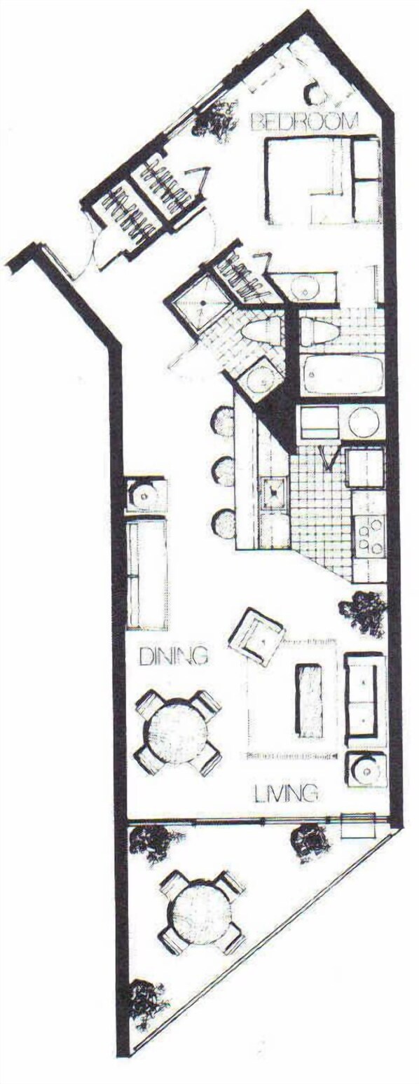 A floor plan of a house with labeled rooms: a bedroom, dining area, and living room. - Maui Sunset Vacation Rentals A516 ocean view (Kihei)