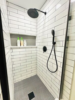 Bathtub, hair dryer, towels, soap