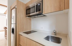 Fridge, microwave, stovetop, coffee/tea maker