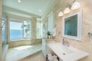 Shower, jetted tub, towels, soap