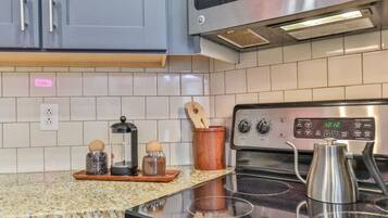 Coffee/tea maker, fridge, microwave, oven