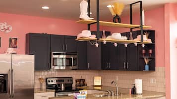 Coffee/tea maker, fridge, microwave, oven
