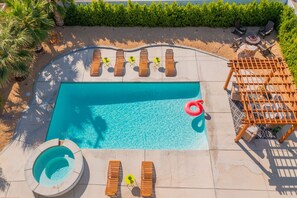 Outdoor pool, a heated pool - NEW! Desert Oasis! Large Pool/Spa + Firepit + Gameroom (Desert Hot Springs)