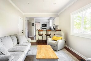 Smart TV, DVD player, foosball, books