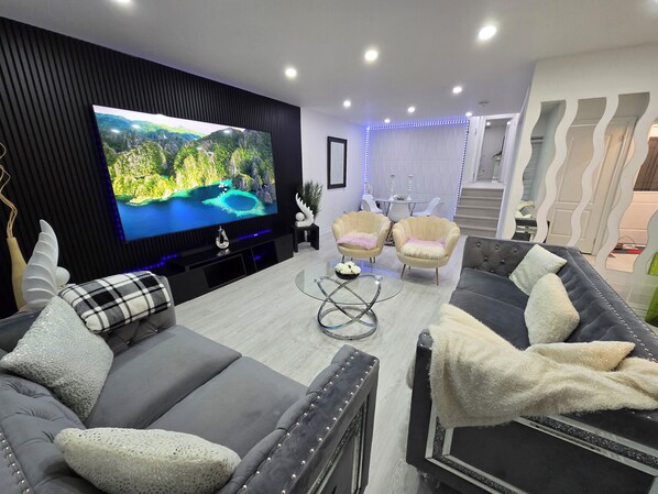 Smart TV, fireplace, table football, books
