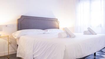 1 dormitorio, tabla de planchar con plancha, Internet y ropa de cama