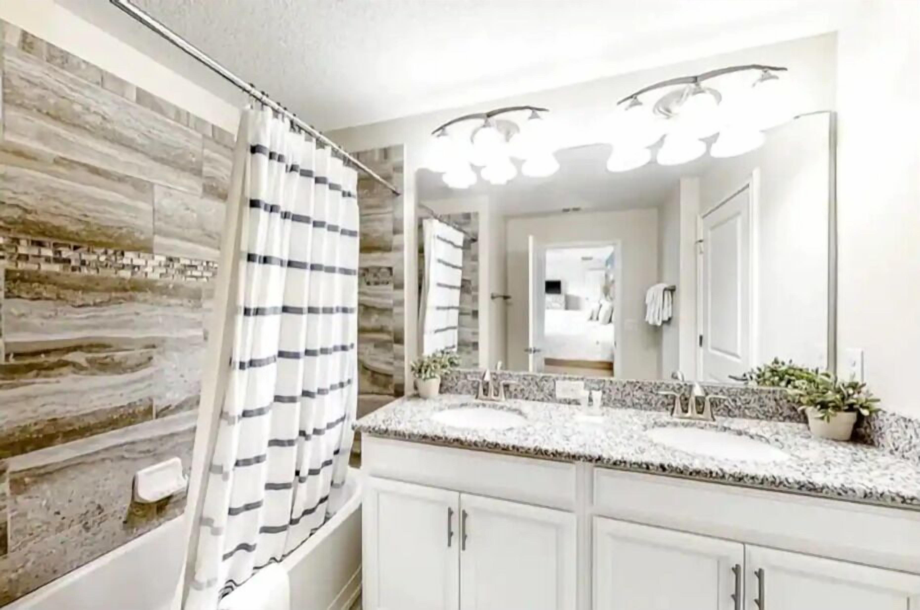 Deluxe Townhome | Bathroom | Hair dryer