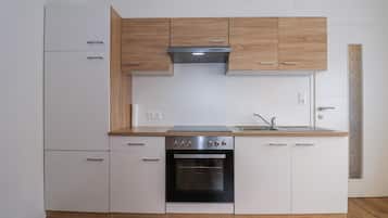 Fridge, stovetop, coffee/tea maker