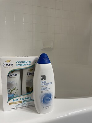 Combined shower/tub, hair dryer, towels, soap