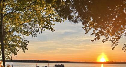 Private Cottage on Manistee Lake with beautiful lake views and sunsets.