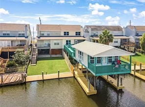 Canal view with bonus boathouse bhrind the townhome