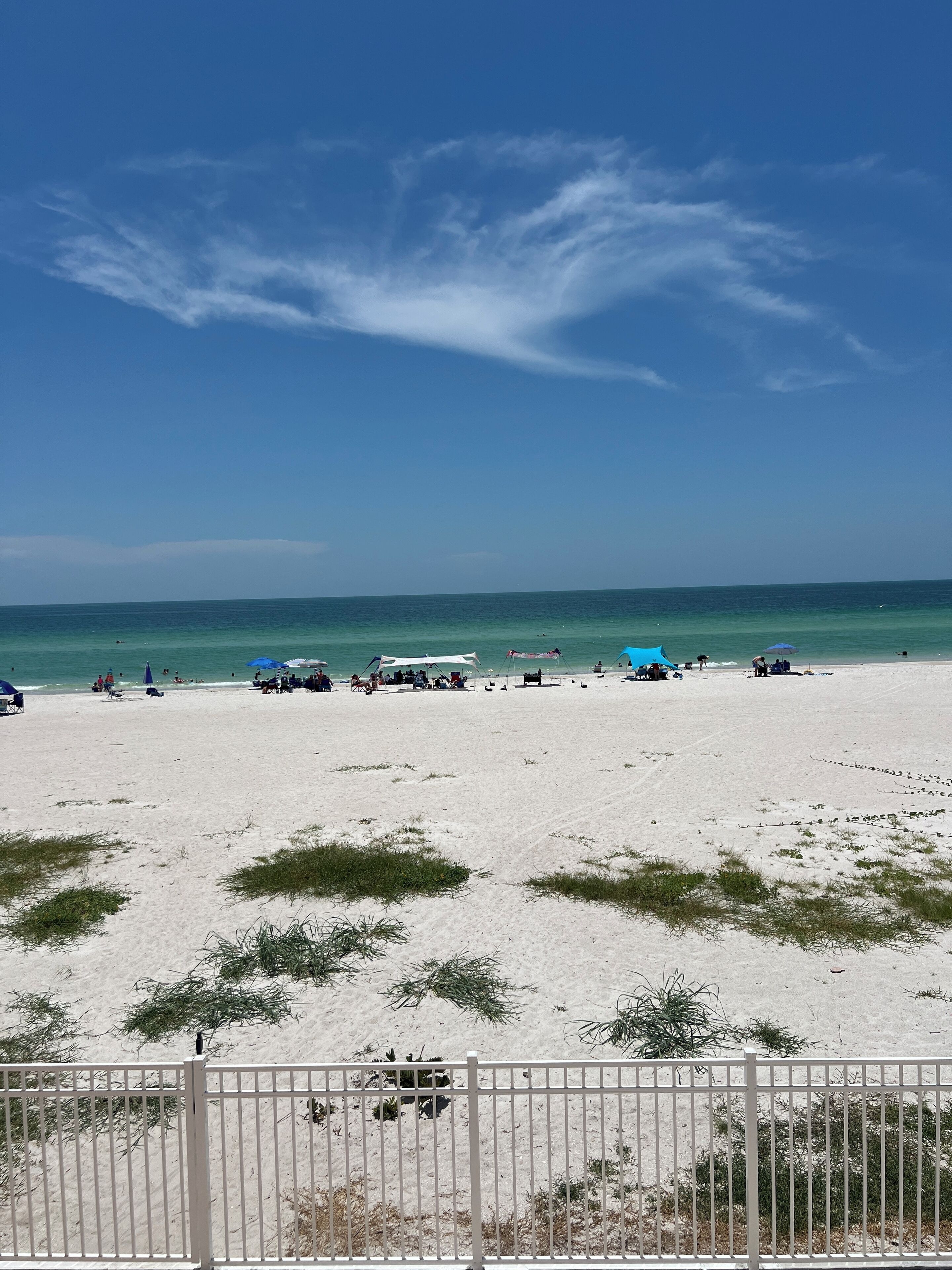 On the beach, sun-loungers, beach towels