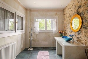 Bathtub, hair dryer, towels