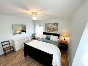 1 bedroom, desk, iron/ironing board, travel crib