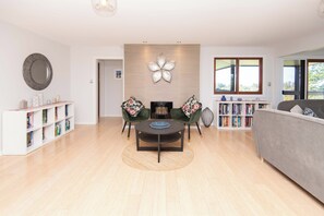 Premium House | Living area | TV, fireplace