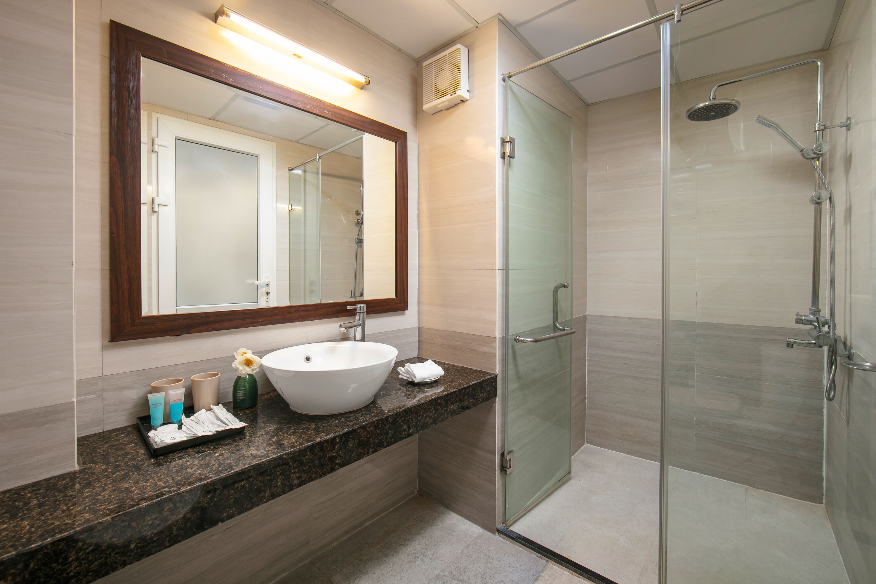 Shower, hydromassage showerhead, designer toiletries, hair dryer