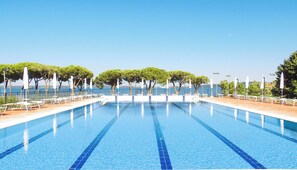Seasonal outdoor pool, open 10:00 AM to 7:00 PM, pool umbrellas - HA HOTEL (Bracciano)