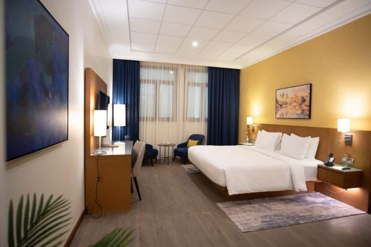 In-room safe, desk, blackout curtains, iron/ironing board