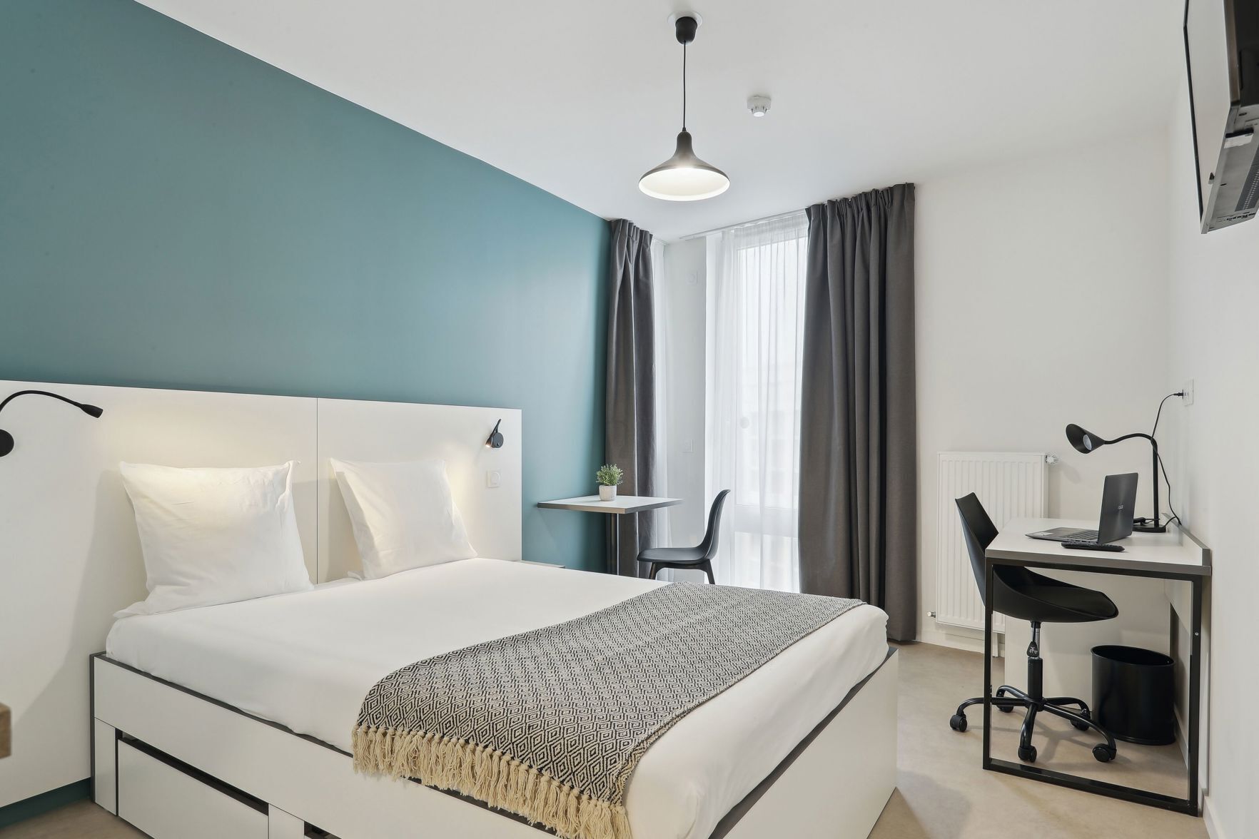 Premium bedding, Select Comfort beds, laptop workspace