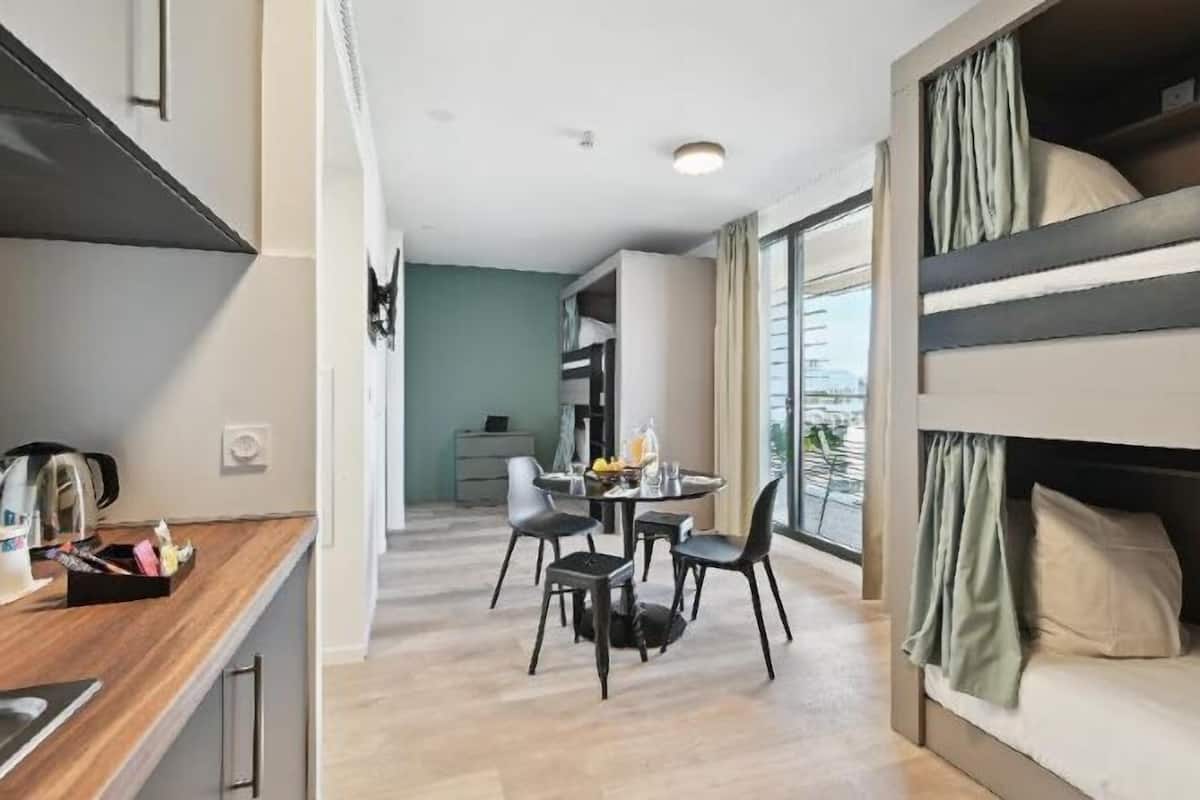 1 bedroom, premium bedding, laptop workspace, blackout curtains
